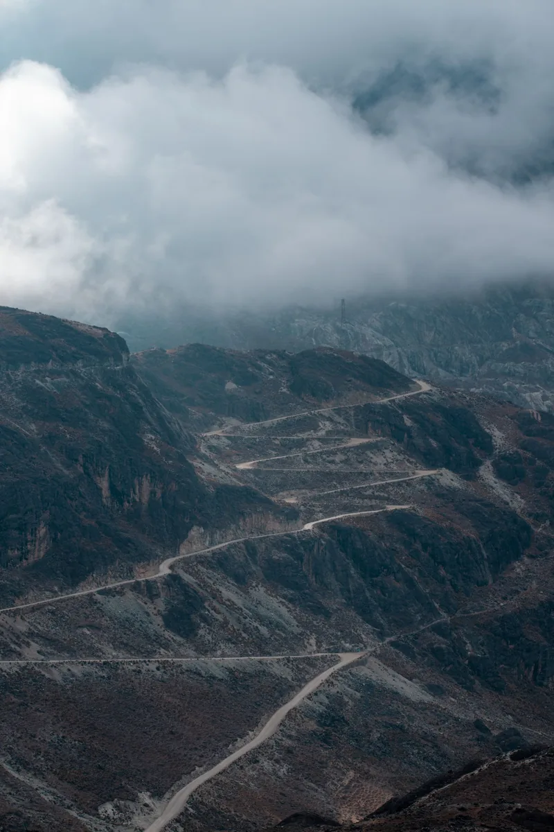 Winding road through high mountains